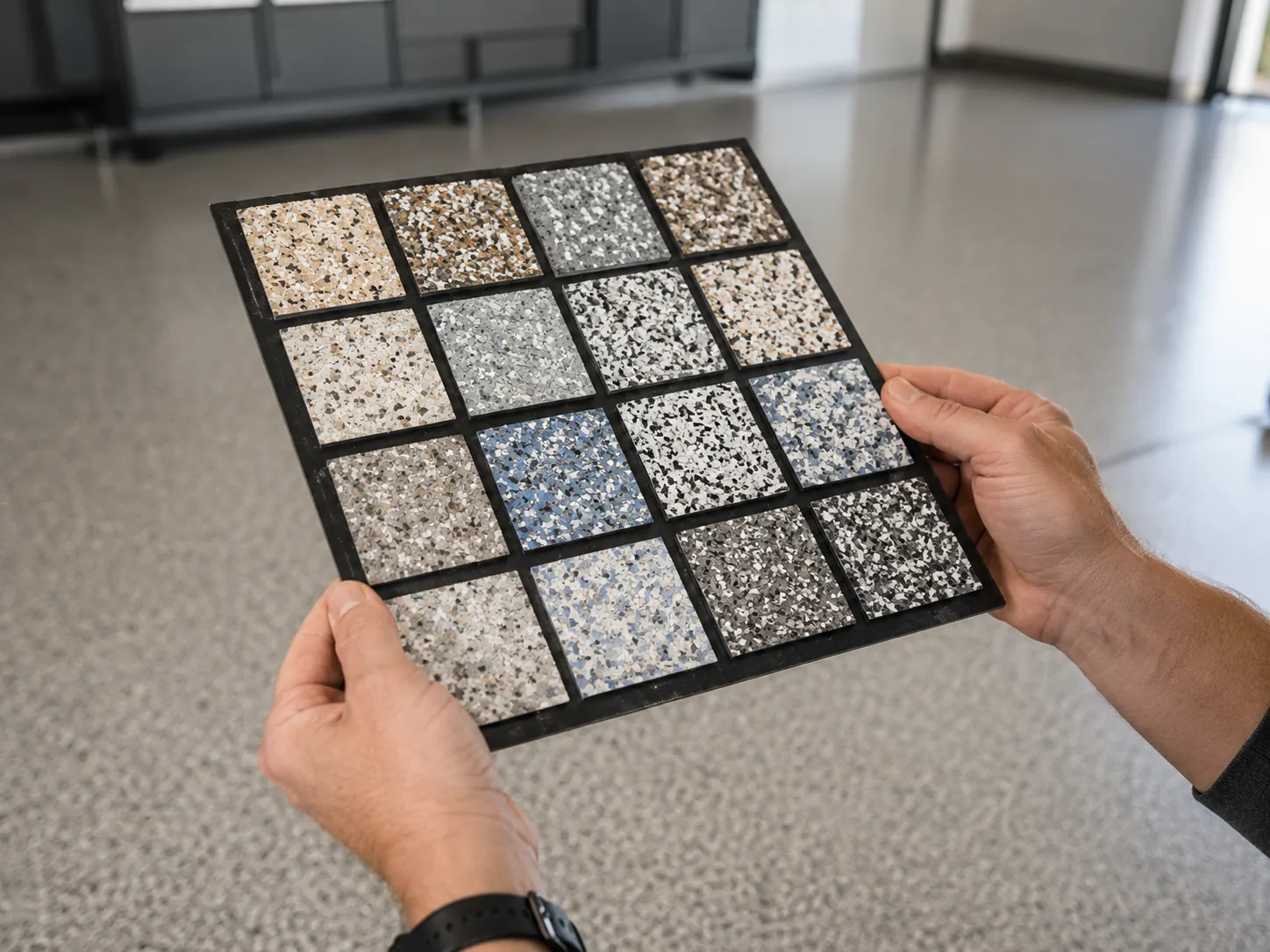 Installer holding a flake blend sample board