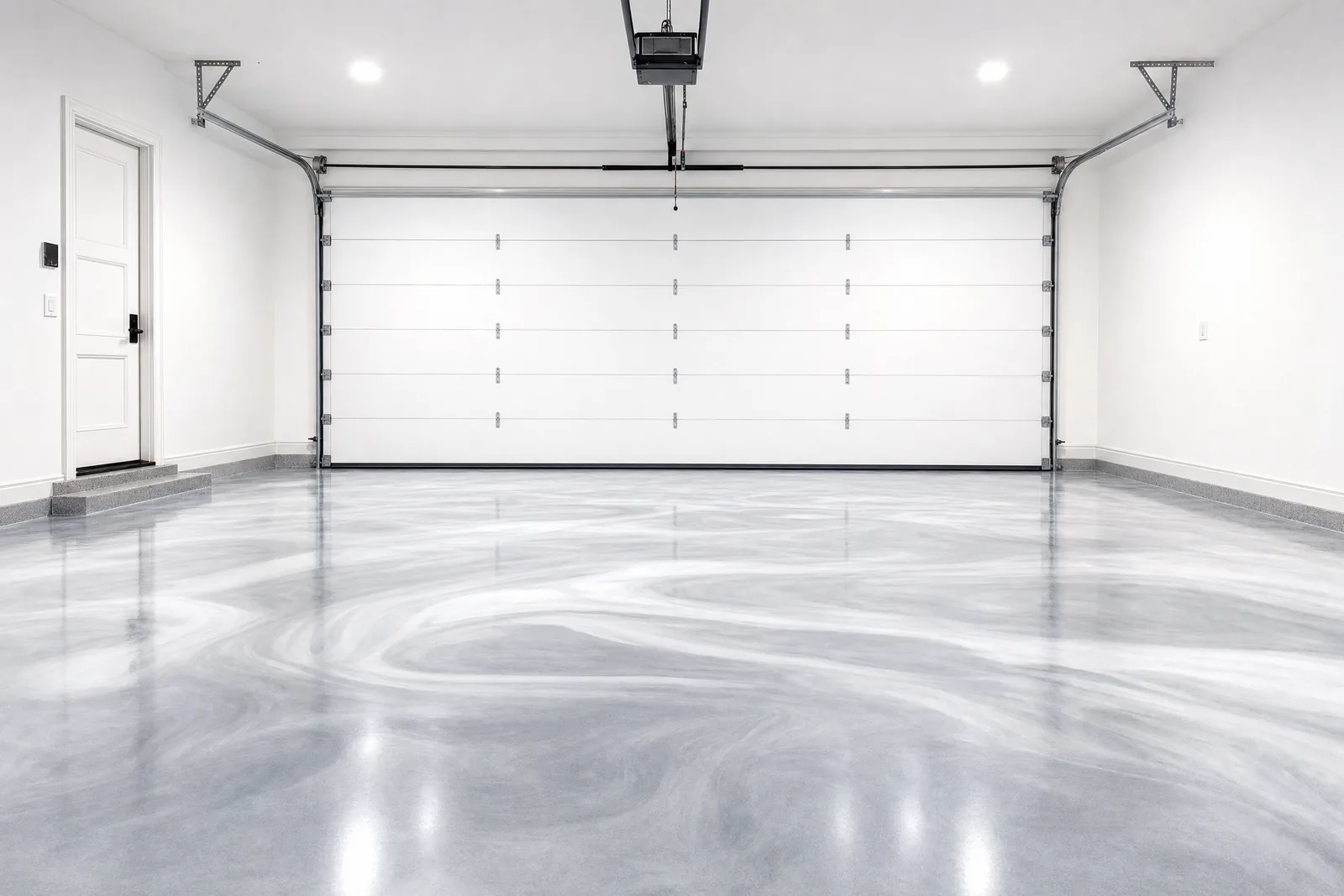 Bright silver metallic epoxy floor under even overhead lighting